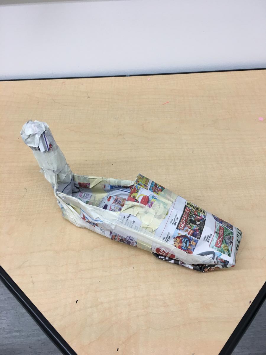 Designing a newspaper shoe